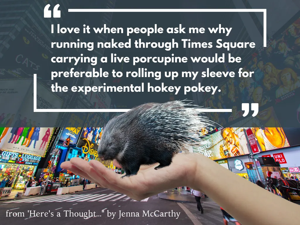 phot of woman holding a porcupine in Times Square